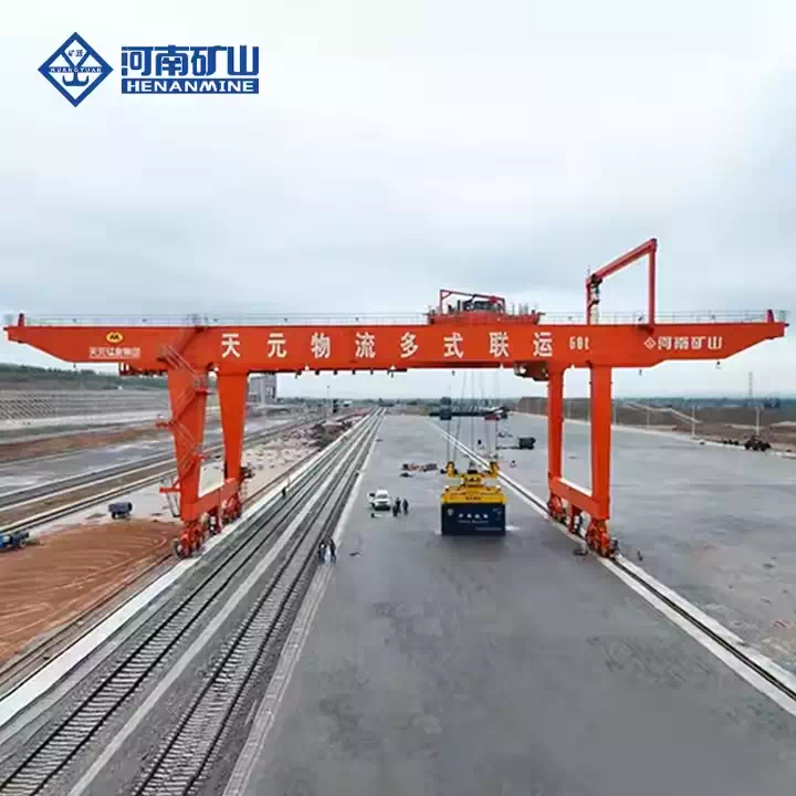 Electric rail gantry crane loading freight train